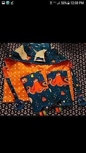 Tula Disney Finding Dory hood suck pads and reach straps. disneybound tula accessories baby wearing