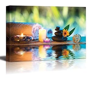 Canvas Prints Wall Art - Three Candles and Towels with Black Zen Stones and Orange Daisy on Water Spa/Wellness/Beauty Concept | Modern Wall Decor- 12" x 18"