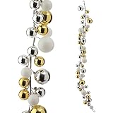 christmas tree decorations in white and gold