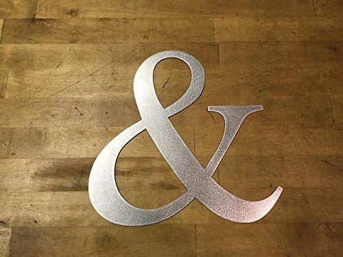 Ampersand sign metal steel wall writing