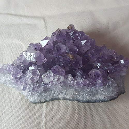 Amethyst Quartz Crystal Druze Cluster 8-10cm used for meditation and relaxation. Excellent size to use for decoration, gift or photography. Great to help with insomnia and nightmares.