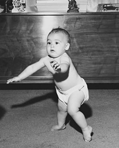 a baby learning to walk