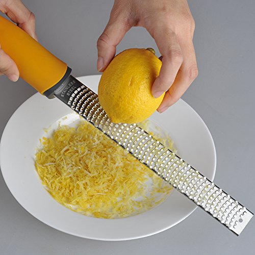 Narrow Citrus Lemon Zester and Kitchen Cheese Grater 18/8 Stainless Steel Slicer for Ginger, Garlic, Nutmeg, Chocolate, Vegetables, Fruits Razor Sharp Blade - Colorfull Ergonomic Handle Color Yellow