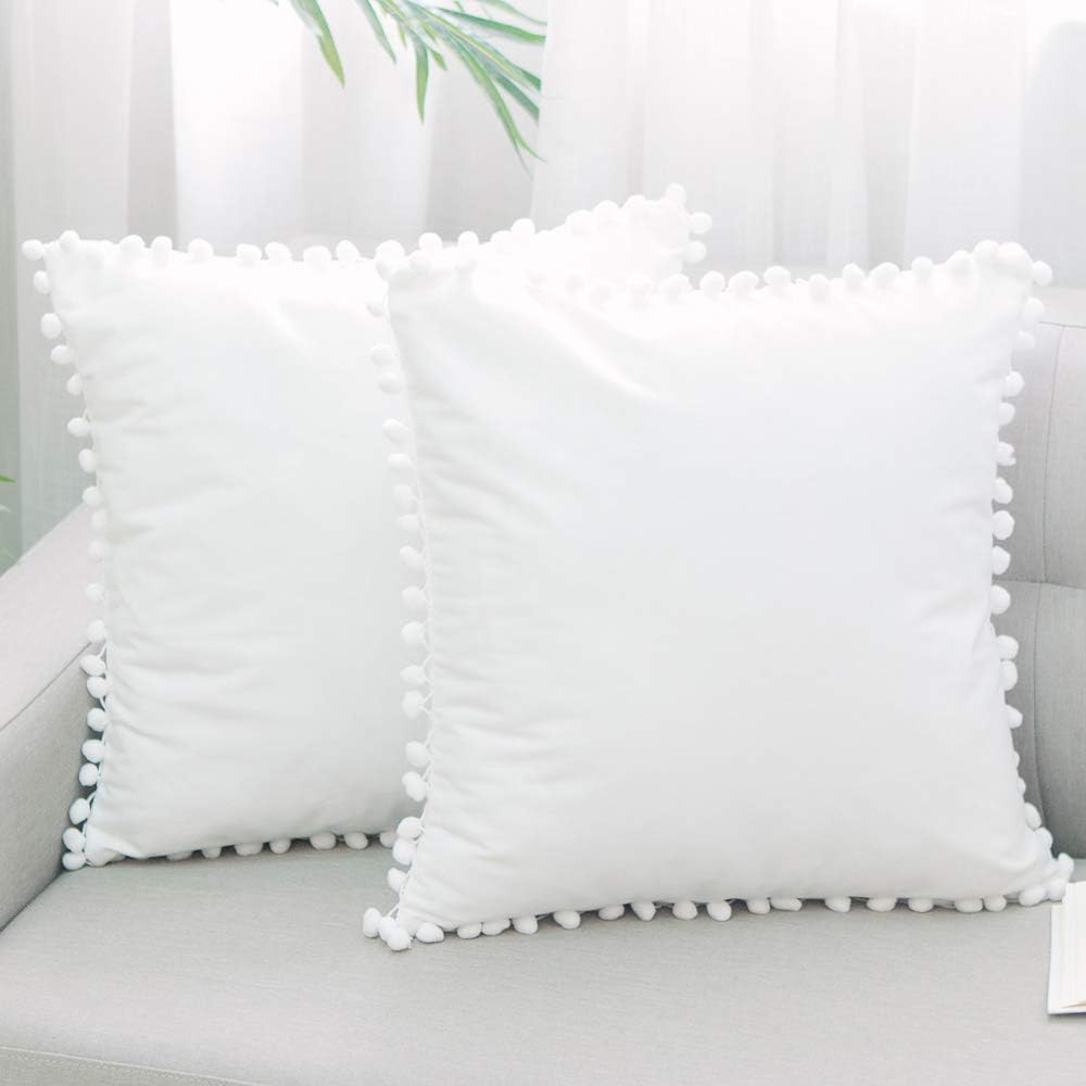 NATUS WEAVER White Velvet Decorative Throw Pillow Covers Pom Poms Soft Solid Square Cushion Cases for Sofa Couch Bedroom Car, Pack of 2, 24 X 24 inches