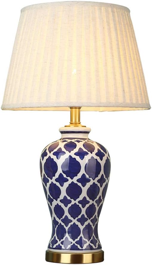 white and copper table lamp