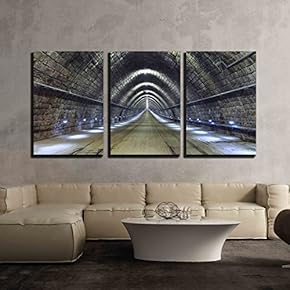 a Train Disappearing into a Tunnel at Night x3 Panels