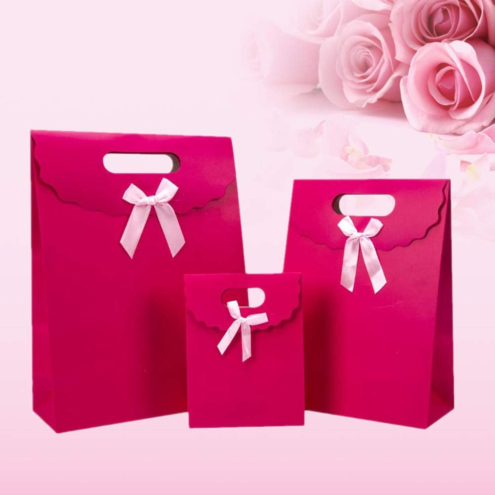 Amazon Co Jp Bestoyard 手提げ袋 紙袋 ラッピング袋 ギフトバッグ 可愛い プレゼント袋 リボン付き お祭り パーティー おしゃれ 6枚入り 三つサイズ 各2枚 ピンク ホーム キッチン