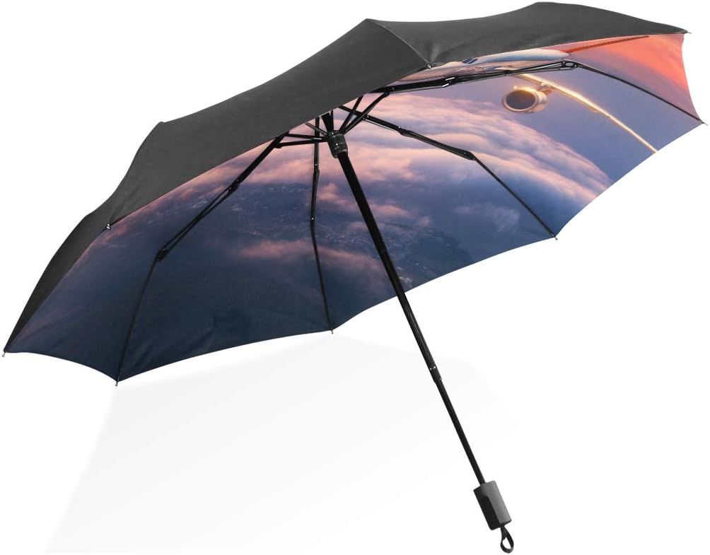 Reversable Umbrella Large Airplane In The Sky At Sunrise