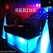 SKRIMS Super Flexible Speaker Stand Cover - Four Way Stretch White Spandex DJ Scrim - 3-Sided Tripod Skirt - 360 Degree Coverage, Cable Management Pass-Thru and Travel Bag
