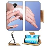 Samsung Galaxy Mega 6.3 Flip Case Skincare Closeup of female hands Young woman girl taking care of her dry hands palms IMAGE 28988468 by MSD Customized Premium Deluxe Pu Leather generation Accessories