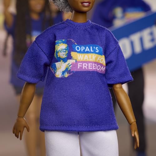 Barbie Inspiring Women Opal Lee Doll, Collectible with Blue "Opal's Walk For Freedom" T-Shirt, White Pants and Glasses, Doll Stand and Display Packaging, JJX60