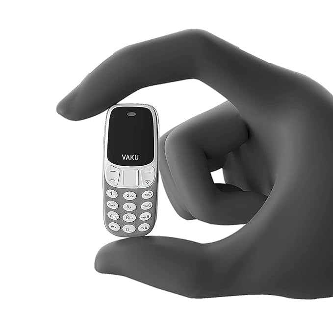 Vaku Luxos World S Smallest Dual Sim Nano Phone With Voice Changer Alarm Bluetooth And More Silver Amazon In Electronics Vaku Luxos World S Smallest Dual Sim Nano Phone With Voice Changer Alarm Bluetooth And More Silver Amazon In Electronics