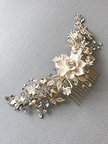 USABride Bridal hair comb offers a luminous touch of nature inspired beauty to your bridal look This headpiece features ivory enamel flowers accented with gold-plated frosted leaves TC-2303-G