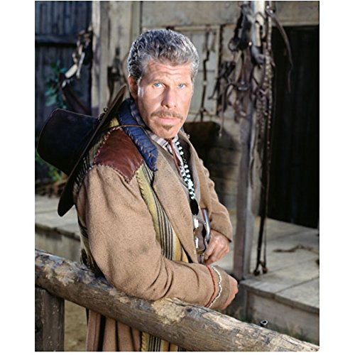 The Magnificent Seven Ron Perlman Wearing Tan Jacket Cowboy Hat Hanging On Back Leaning On Wood Fence Arm Bent 8 X 10 Inch Photo