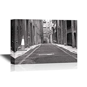 Canvas Wall Art - Quiet Lane Among Buildings in Black and White - Gallery Wrap Modern Home Art | Ready to Hang - 12x18 inches