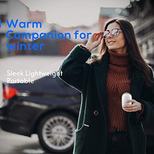 A hand warmer in a pocket, emitting heat.