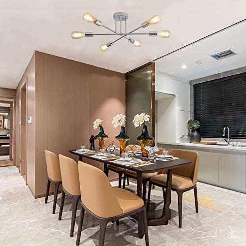 Modern ceiling light fixture with three gentle bulbs, suitable for a bedroom setting.