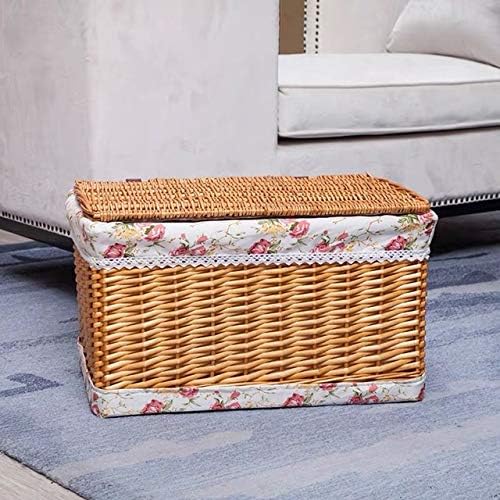 Cesta de lavandería hecha a mano de mimbre con una tapa de tela