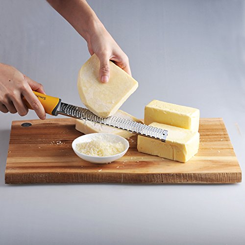 Narrow Citrus Lemon Zester and Kitchen Cheese Grater 18/8 Stainless Steel Slicer for Ginger, Garlic, Nutmeg, Chocolate, Vegetables, Fruits Razor Sharp Blade - Colorfull Ergonomic Handle Color Yellow
