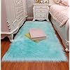 Faux Fur Sheepskin Rug,Machine Washable, Makes a Soft, Stylish Home Décor Accent for a Kid's Room, Bedroom, Nursery… 51BSKEYt8iL. SS100