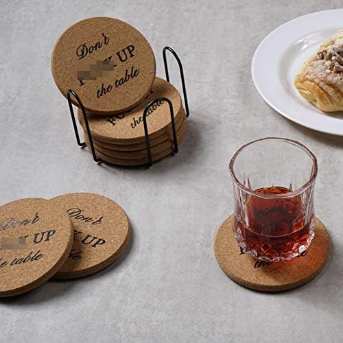 Set of four cork coasters in a holder, designed by Adorever.