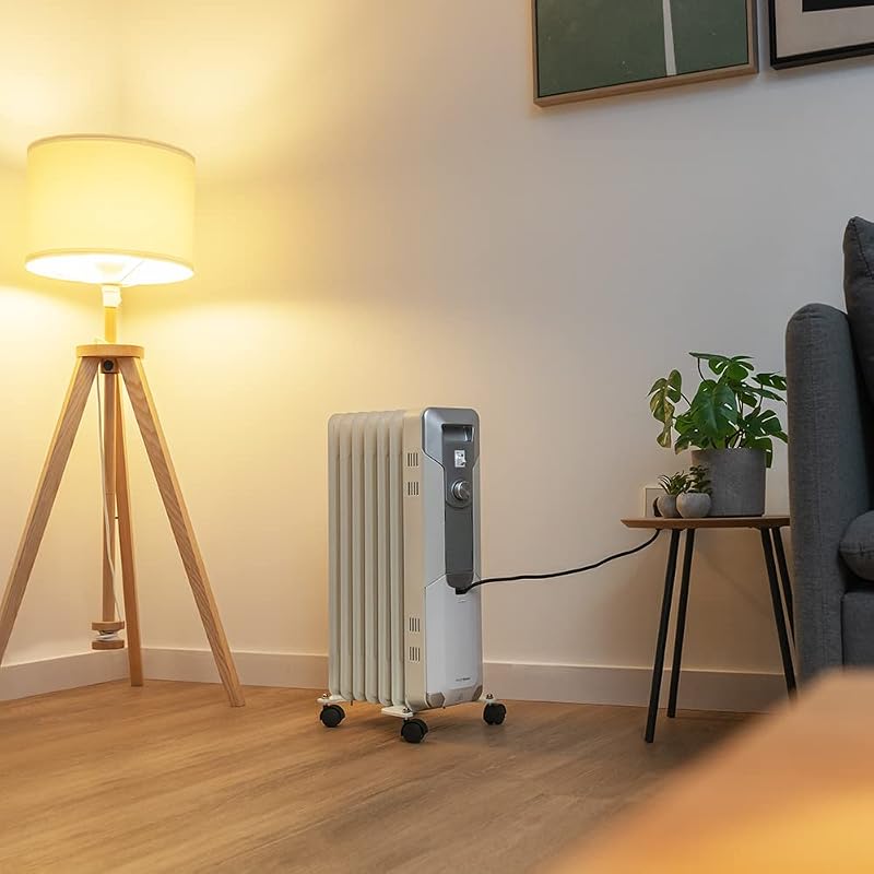 Radiatore elettrico ad olio ReadyWarm 7000 Space. 7 moduli, basso consumo energetico, 1500 W, 3 Livelli, Raccoglitore di Cavi, Sistema di Sicurezza, Ruote, 15 m2