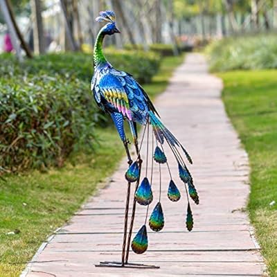 Decorative peacock garden sculpture on the sidewalk