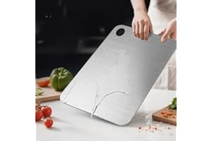 A stainless steel round-hole cutting board designed for use in the kitchen, suitable for cutting vegetables and fruits