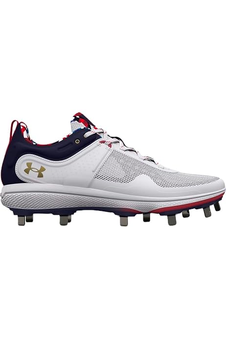 gold and white softball cleats