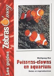 Poissons-clowns en aquarium marin