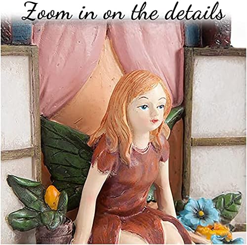 Fairy tree sculpture in a backyard setting, priced at $15.99 as of August 9, 2023.