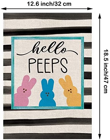 Double-sided burlap backyard flag with decor.