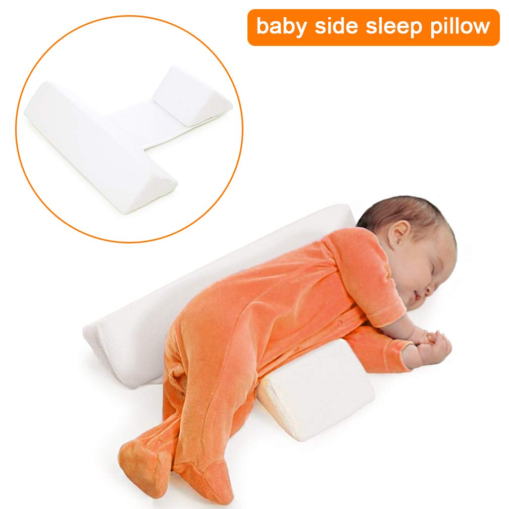 baby sleeping on feeding pillow