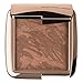 Hourglass Ambient Lighting Bronzer in Radiant Bronze Light. Highlighting Bronzer for a Natural Sun-Kissed Glow. Vegan and Cruelty-Free.