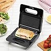 Daewoo-SDA1562-3-in-1-Snack-Maker-Sandwich-Waffle-Panini-Press-with-Detachable-Plate-and-Non-Stick-Coating-Cool-Touch-Housing-and-2-Indicator-Lights-Controlled-by-Termostat-Silver Daewoo SDA1562 3-in-1 Snack Maker, Sandwich, Waffle & Panini Press with Detachable Plate and Non-Stick Coating Range…