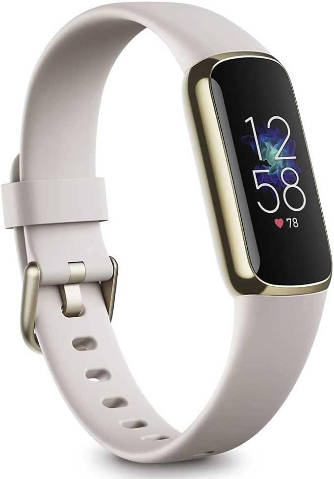 Photo 1 of Fitbit Luxe Soft Gold Stainless Steel Case & Lunar White Band