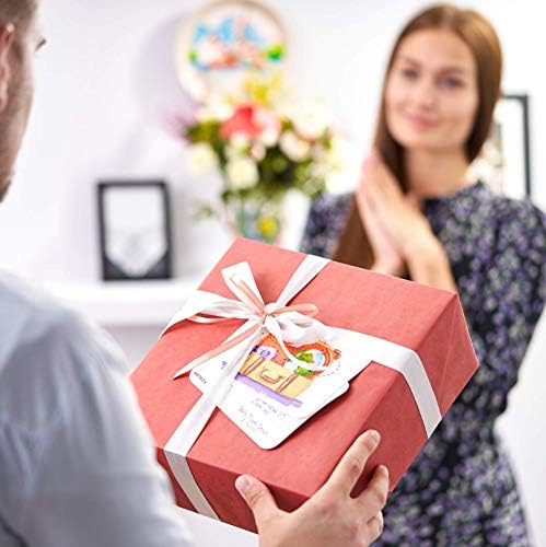 Watercolor playing cards with intricate designs on paper.