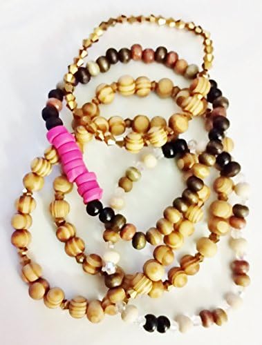 Beaded stretch bracelet lot (5). Size 6.25-8") Made with a variety of beads (brown wooden, hot pink wooden &amp; gold tone metal bicones). BJS593