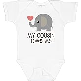 inktastic My Cousin Loves Me Baby Bodysuit