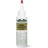 Wild Growth Hair Oil - 4oz/118.291ml by Wild Growth | Concentrated coconut, olive and jojoba blend thickens thin edges; use a few drops at a time