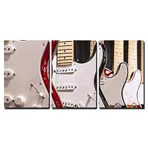 a Row of Electric Guitar on Display x3 Panels