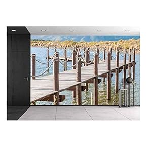 Repeating Pattern of Wooden Poles in a Jetty in a Dam Near Sir Lowrys Pass - Removable Wall Mural | Self-Adhesive Large Wallpaper - 66x96 inches