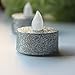 LOGUIDE Battery Operated LED Tea Lights, Silver Glitter Flameless Votive Tealights Candle with Warm Amber,Pack of 12,Small Electric Fake Tea Candle Realistic for Wedding,Festival Celebration