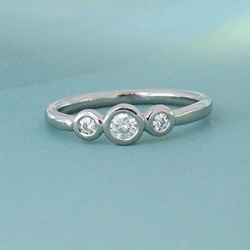Palladium 950 and Moissanite Three Stone Bezel Engagement Ring