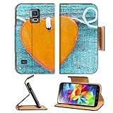 Samsung Galaxy S5 Romantic orange wooden heart on a colourful textured turquoise wood background with decoratively coiled rope for Valentines or an anniversary 26700789 by MSD Customized Premium Deluxe Pu Leather generation Accessories HD Wifi 16gb 32gb Luxury Protector Case