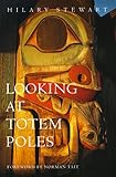 Front cover for the book Looking at Totem Poles by Hilary Stewart