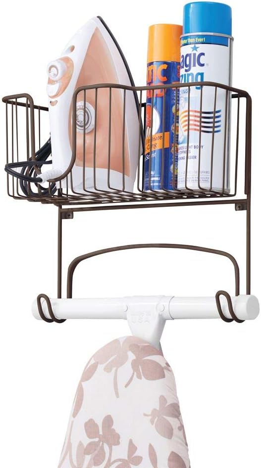 mDesign Metal Wall Mount Ironing Board Holder with Large Storage Basket - Holds Iron, Board, Spray Bottles, Starch, Fabric Refresher for Laundry Rooms - Bronze: Home & Kitchen