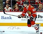 Trevor van Riemsdyk Chicago Blackhawks Autographed 16" x 20" Red Jersey Skating Photograph - Fanatics Authentic Certified