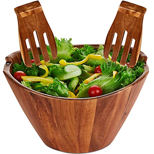 Wooden salad bowl set with serving forks mixing serving
