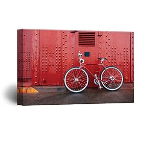 A Bike in Front a Red Wall